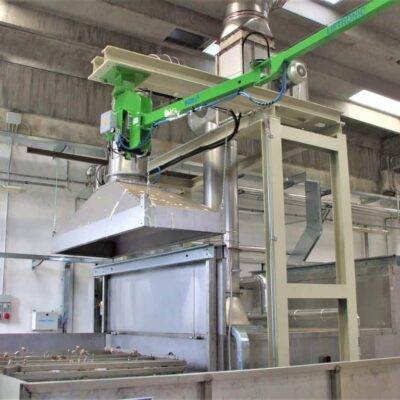 104621_015 An INDEVA manipulator makes lthe use of a latex sprayer easy and effortless