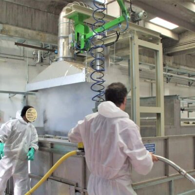 104621_018 An INDEVA manipulator makes lthe use of a latex sprayer easy and effortless